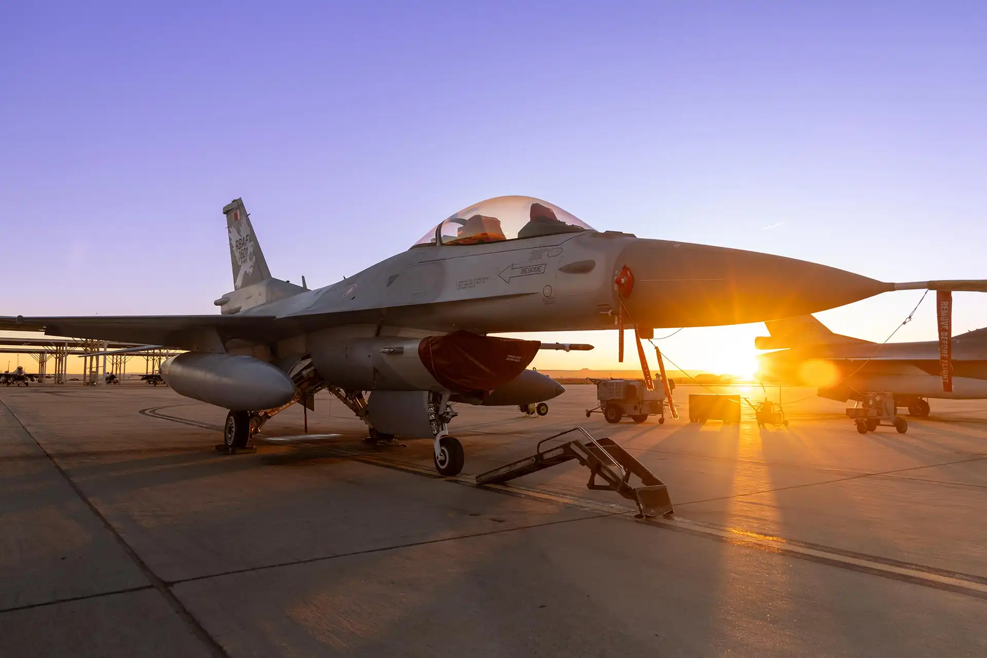 F-16 Block 70 on the flight line at sunset